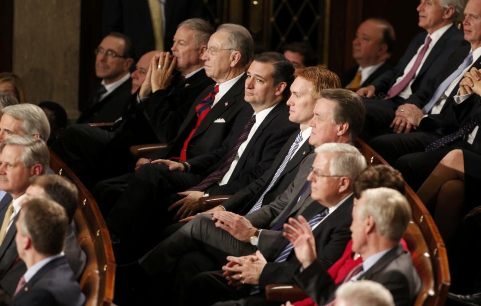 U.S. Rep. Cruz and Republican congressional colleagues listen as U.S. President Obama delivers his State of the Union address to a joint session of the U.S. Congress on Capitol Hill in Washington
