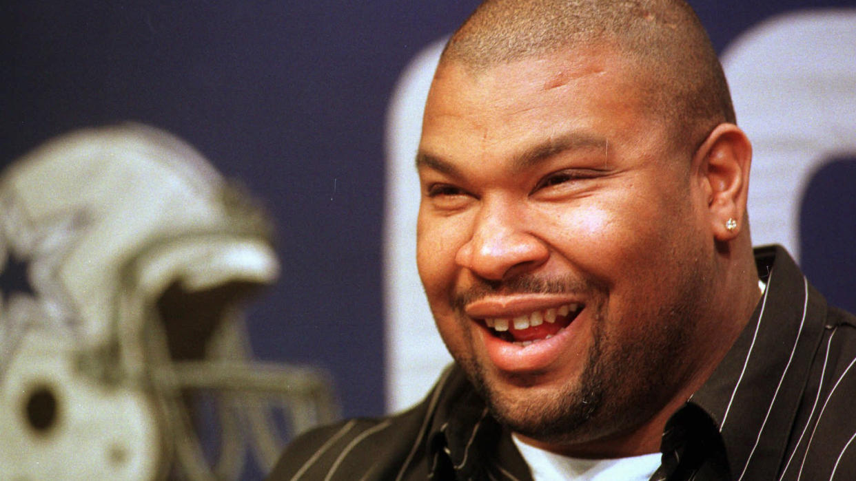 Mandatory Credit: Photo by Lm Otero/AP/Shutterstock (6494281a)ALLEN Larry Allen smiles at a news confernce anouncing a new contract with the Dallas Cowboys in Irving, Texas, .