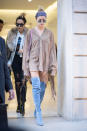 <p>Not the first time the young model has not bothered with bottoms. We almost witnessed a wardrobe malfunction during Paris fashion week when she stepped out in wearing only a pair of thigh-high boots and fringed top. <i>(Photo by Timur Emek/Getty Images)</i></p>