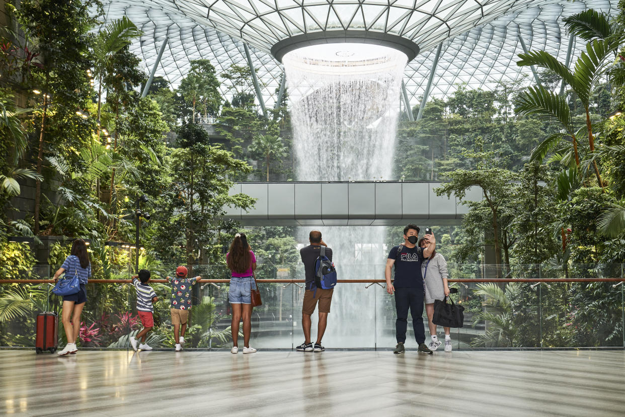 FILE PHOTO: Visitors at Jewel Changi Airport mall in Singapore, on Wednesday, 20 April 2022. (Photo: Lauryn Ishak/Bloomberg)