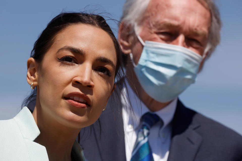 Representative Alexandria Ocasio-Cortez and Senator Ed Markey lead a news conference to re-introduce the Green New Deal at the Capitol on April 20, 2021. / Credit: JONATHAN ERNST / REUTERS
