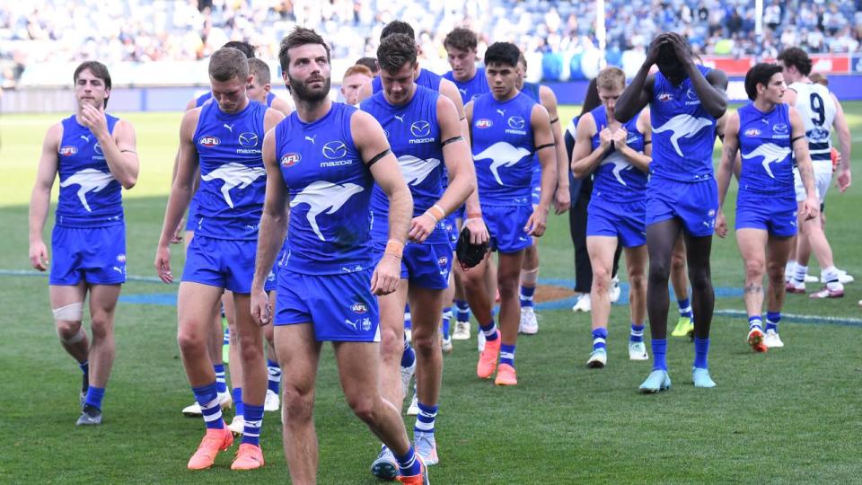 Disappointed North Melbourne players.