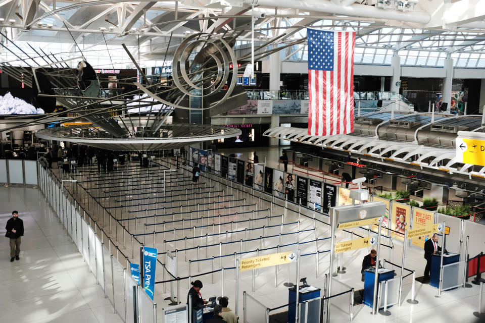 A sparse international departures terminal at John F. Kennedy International Airport in New York City on March 7. Days later, as concerns over the coronavirus grew, President Trump announced restrictions on travelers from Europe. | Spencer Platt—Getty Images