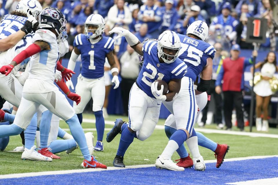 Indianapolis Colts running back Zack Moss (21) runs into the end zone for a touchdown against the Tennessee Titans during the second half of an NFL football game, Sunday, Oct. 8, 2023, in Indianapolis. | Michael Conroy, Associated Press