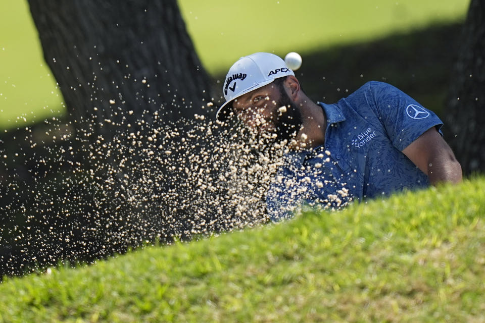 Jon Rahm, of Spain, plays a shot from a bunker on the fifth hole during the third round of the Dell Technologies Match Play Championship golf tournament in Austin, Texas, Friday, March 24, 2023. (AP Photo/Eric Gay)