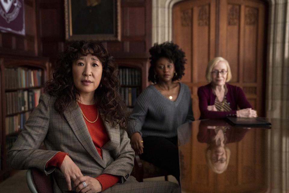 This image released by Netflix shows Sandra Oh, from left, Nana Mensah and Holland Taylor in a scene from "The Chair." (Eliza Morse/Netflix via AP)