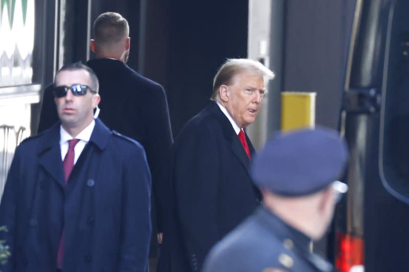 Former President Donald Trump leaves Trump Tower for a court appearance on Monday. He was due to pay a $454 million judgment for civil fraud in New York, but the appeals court granted him 10 days to pay a reduced bond of $175 million. Photo by John Angelillo/UPI