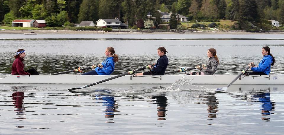 Clam Island Rowing's (left to right) Clara Walsh, Abby Holland, Addison Winger, Mia Kalmbach and Ava Rudon row past the Keyport Marina on Tuesday, May 17, 2022. 