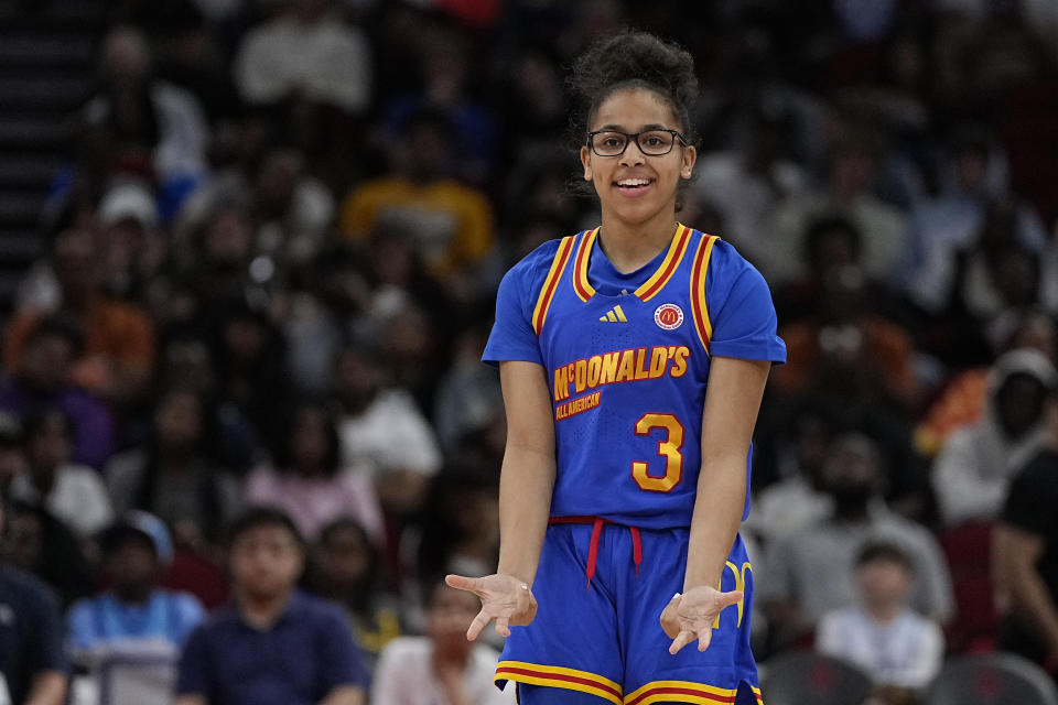 East guard Zam Jones celebrates after hitting a 3-pointer during the first quarter of the McDonald's All American girls' basketball game Tuesday, April 2, 2024, in Houston. (AP Photo/Kevin M. Cox)