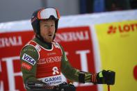 FILE - United States' Ted Ligety celebrates at the finish area of an alpine ski, men's World Cup giant slalom, in Garmisch Partenkirchen, Germany, in this Sunday, Feb. 2, 2020, file photo. Two-time Olympic champion Ted Ligety says he will retire from World Cup ski racing after the world championships. Ligety’s final race will be the giant slalom on Feb. 19 in Cortina d’Ampezzo, Italy. (AP Photo/Marco Trovati, File)