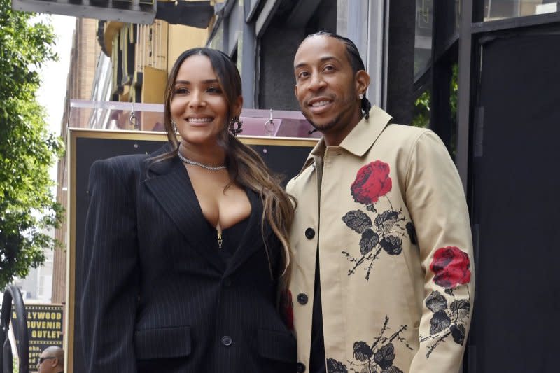 Ludacris (R) and Eudoxie Mbouguiengu attend his Hollywood Walk of Fame ceremony in May. File Photo by Jim Ruymen/UPI