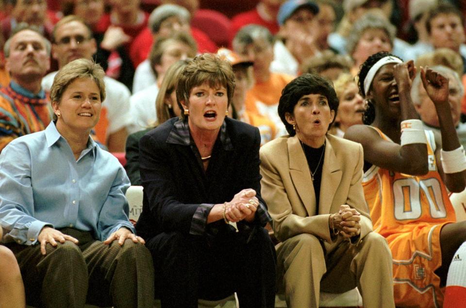 Pat Summitt, second from left, watches from the sidelines along with now current Tennessee coach Holly Warlick, left, and Louisiana Tech assosciate head coach Mickie DeMoss.