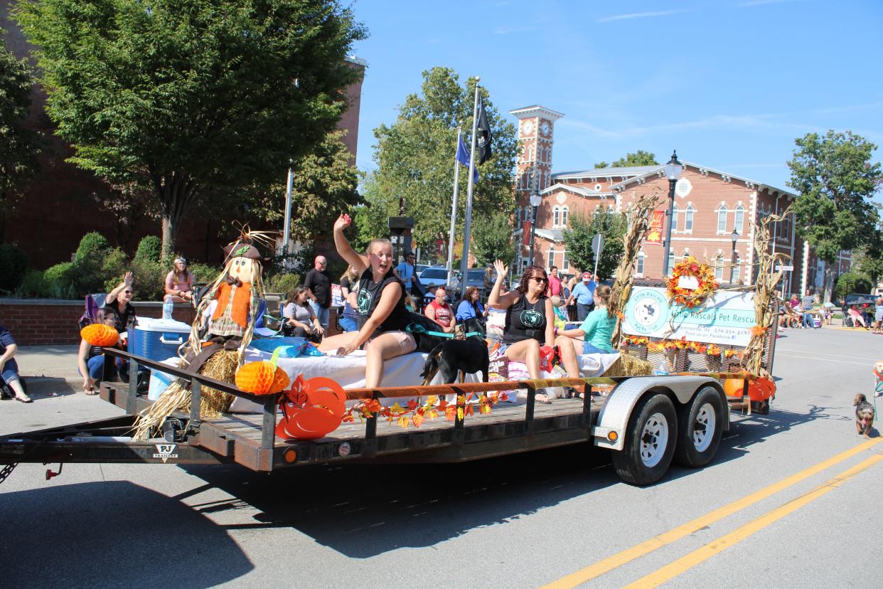 The Little Rascals Pet Rescue float turns onto Jefferson Street in downtown Martinsville during the 2021 Fall Foliage Festival Parade. The float was presented with the Maple Leaf Award.