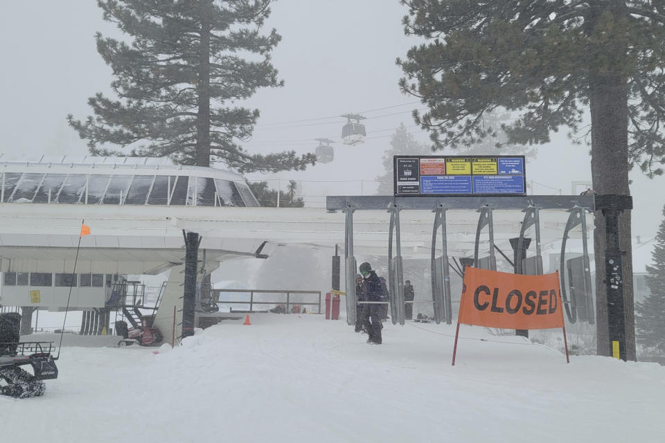 Rescues crews work at the scene of an avalanche at the Palisades Tahoe ski resort on Wednesday, Jan. 10, 2024, near Lake Tahoe, Calif. The avalanche roared through a section of expert trails at the ski resort as a major storm with snow and gusty winds moved into the region, authorities said. (Mark Sponsler via AP)