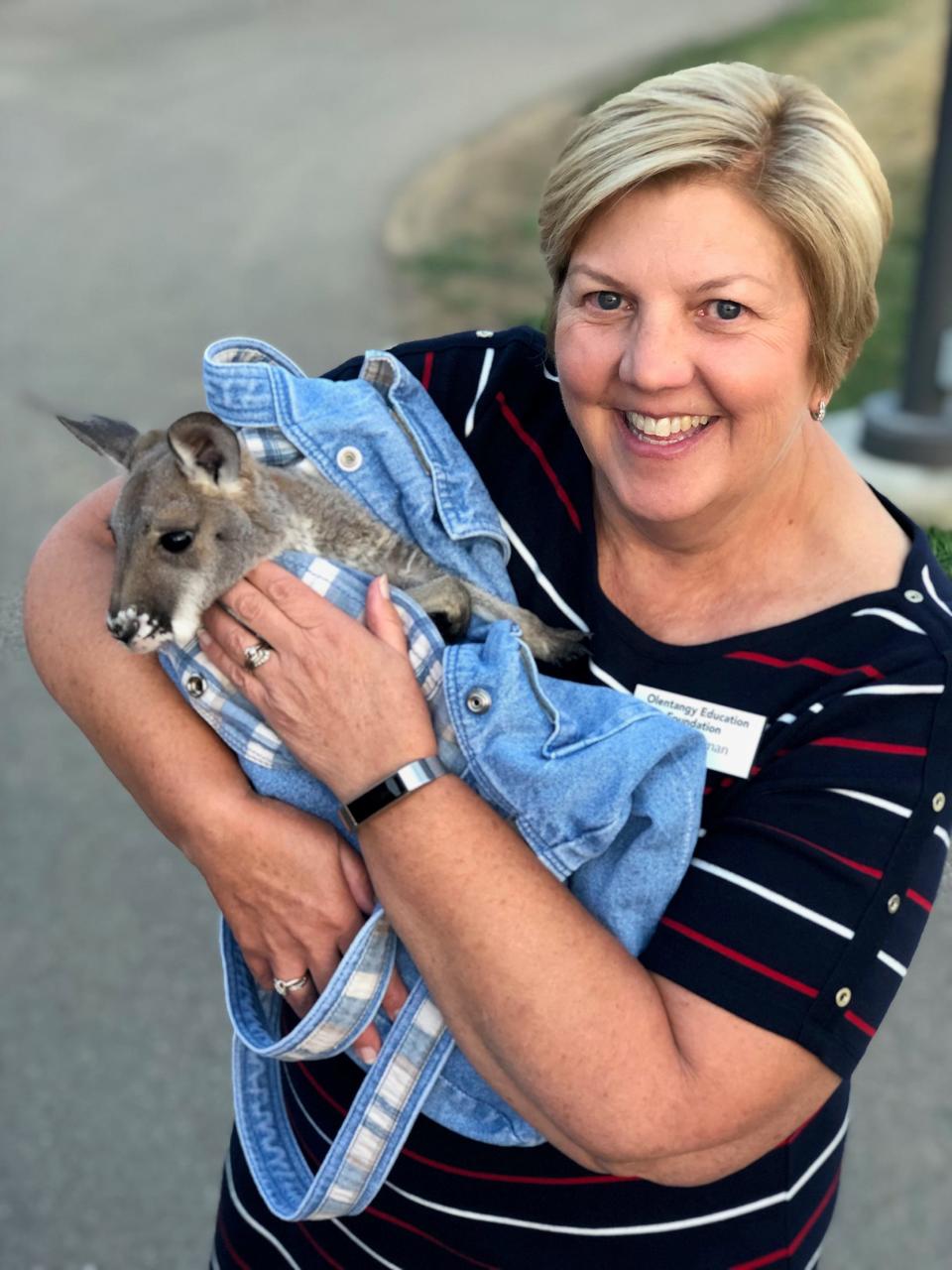 Pam Bachman holds a baby kangaroo during the 2019 ZOOlentangy event.