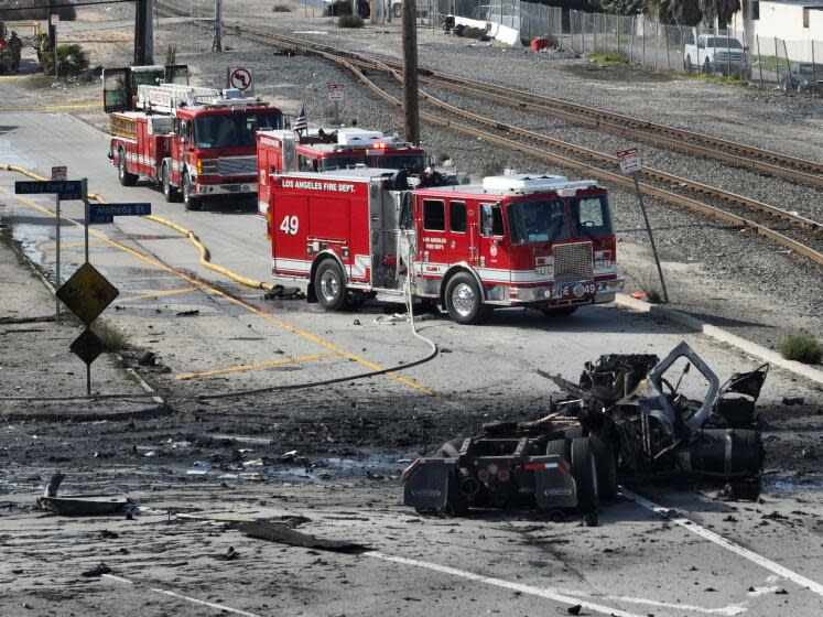 Wilmington, CA - February 15: Aerial view of truck explosion where several firefighters were injured, at least two critically, in an explosion involving a truck with pressurized cylinders in Wilmington Thursday, Feb. 15, 2024. Firefighters were sent to the 1100 block of North Alameda Street shortly before 7 a.m., according to Nicholas Prange of the Los Angeles Fire Department. ``Several other injured are being evaluated on scene, awaiting additional ambulances to arrive -- (an) estimated seven total firefighters,'' Prange said.(Allen J. Schaben / Los Angeles Times)