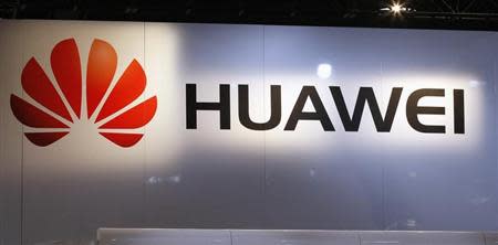 The logo for Chinese phone maker Huawei hangs above their booth on the first day of the Consumer Electronics Show (CES) in Las Vegas January 8, 2013. REUTERS/Rick Wilking