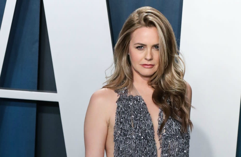 Alicia Silverstone on rising her on to care for animals credit:Bang Showbiz