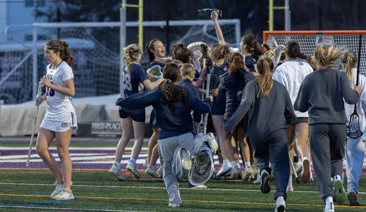 Manasquan celebrate their win over Rumson-Fair Haven. Manasquan Girls Lacrosse outlasts Rumson-Fair Haven 10-9 in Rumson on April 23, 2024.