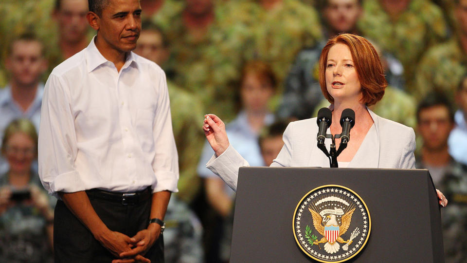 Obama and Gillard had a strong relationship. Here, Obama looks on as Gillard addresses the troops at RAAF base in Darwin, 2011. Source: AAP