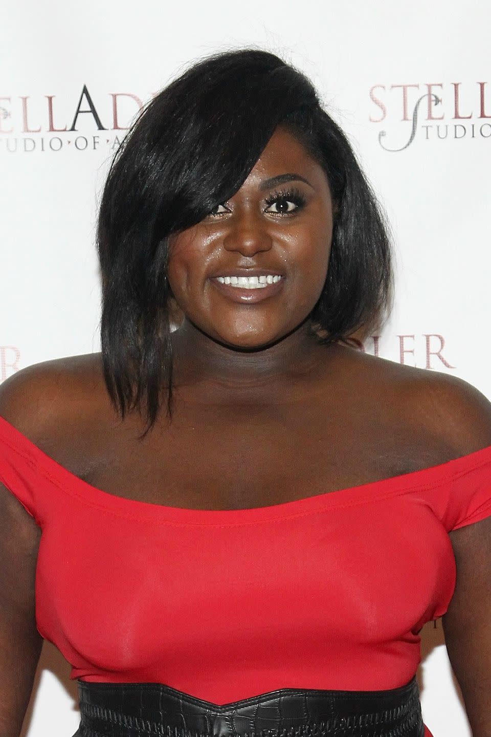 <p>To get this standout polished hairstyle worn by <strong>Danielle Brooks</strong>, ask your stylist to give you an asymmetrical angled bob with swoop bangs.</p>