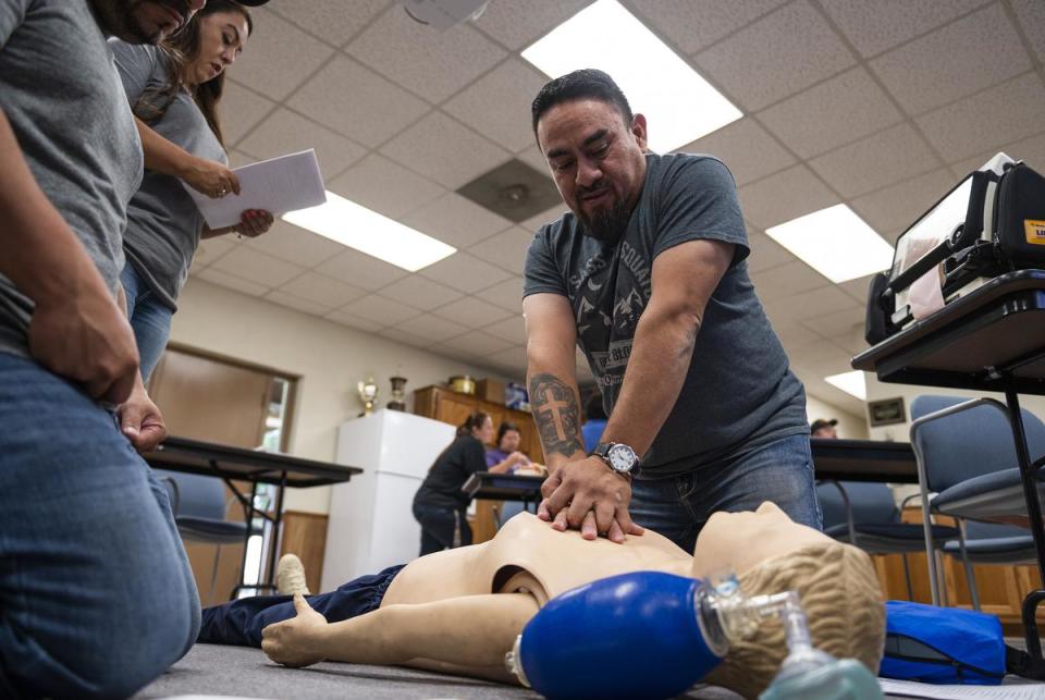 Jose Martinez practices CPR during an EMT certification class in the Olton Volunteer Ambulance Association Monday, July 10, 2023, in Olton, Texas. (Justin Rex for The Texas Tribune)