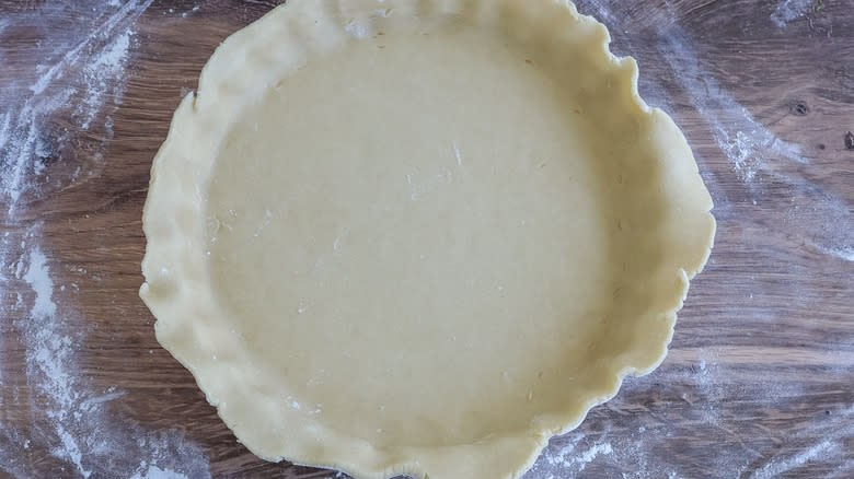 quiche dough in a pan