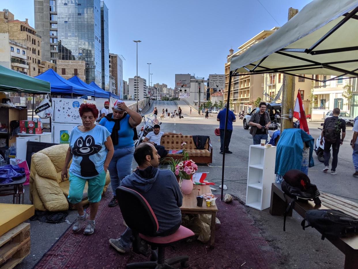 Protesters set up a living room on the main ring road in Beirut as part of a road block: Richard Hall/The Independent