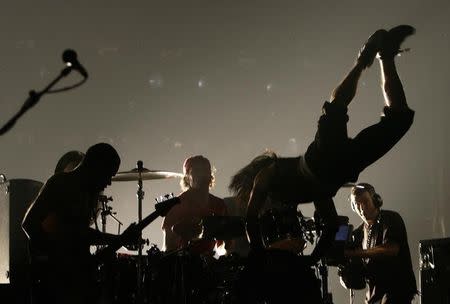 Red Hot Chili Peppers perform at the Brit Awards at the Earls Court Arena in London February 14, 2007. REUTERS/Kieran Doherty