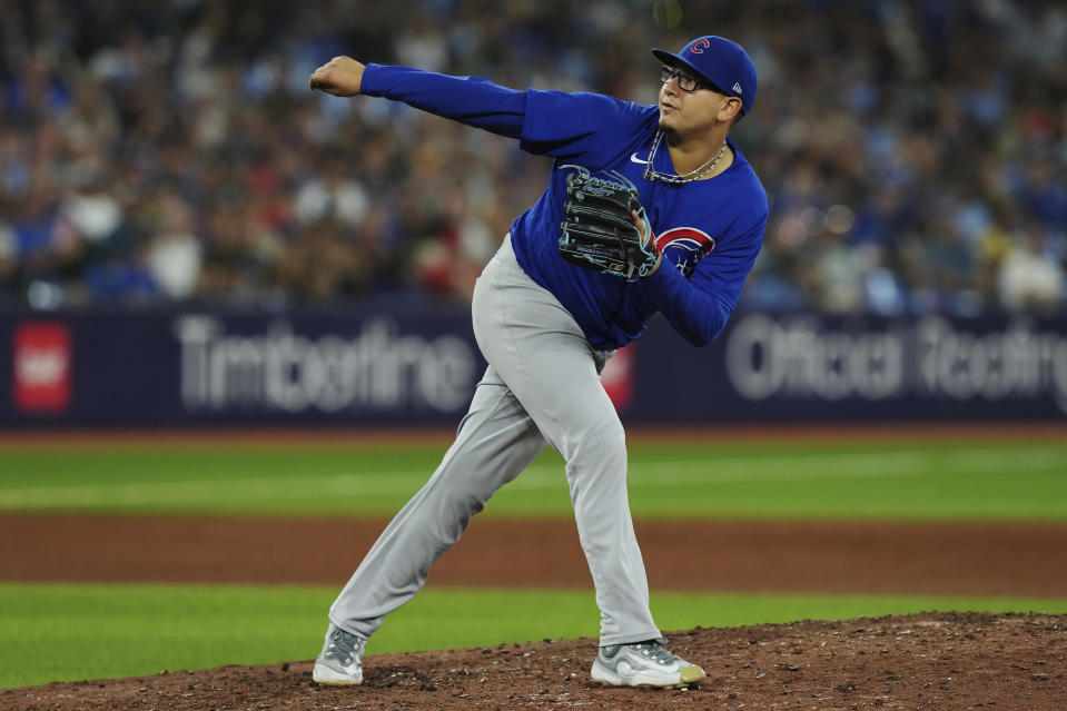 Chicago Cubs starting pitcher Javier Assad works against the Toronto Blue Jays during fifth-inning baseball game action in Toronto, Friday, Aug. 11, 2023. (/Chris Young/The Canadian Press via AP)