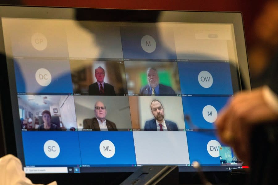 <em>A screen for a teleconference is shown in court in Las Vegas, on Monday, Dec. 18, 2023, where six Republicans pleaded not guilty to two felony charges each, stemming from their roles as fake electors in 2020 where they signed certificates falsely claiming former President Donald Trump won Nevada over Joe Biden. (AP Photo/Ty O’Neil)</em>