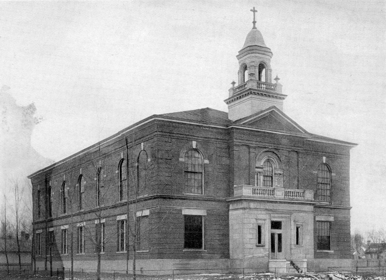 The original Holy Name School was located at the corner of Second and Adams streets in 1905 but this photo dates from about 1911. It became known as Holy Name Grade School in 1951 after a new high school was built down the block. The 1905 building was razed in 1970 after the high school was discontinued and grade school students were moved into the newer building, which is the core of the school that still stands.