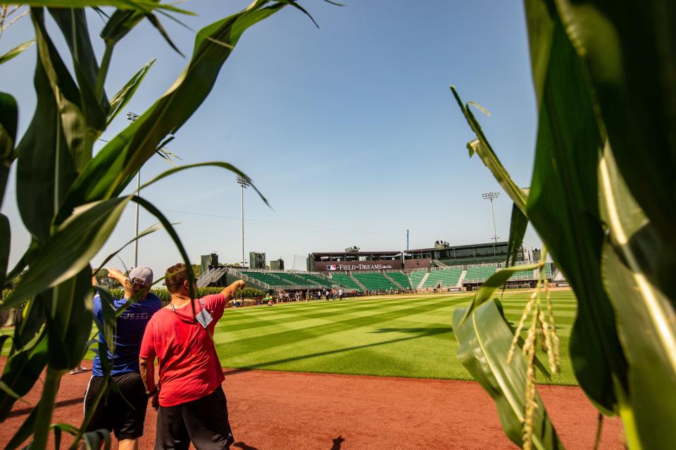 Members of the media tour the new stadium where Major League Baseball will host tomorrow's game between the New York Yankees and the Chicago White Sox near the Field of Dreams movie site outside of Dyersville, Wednesday, Aug. 11, 2021.