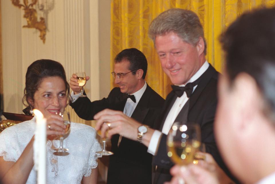 This photograph of President Bill Clinton and Nilda Patricia Velasco de Zedillo, First Lady of Mexico, toasting after remarks made by Mexican President Ernesto Zedillo, seen in the background, was taken at a state dinner on October 10, 1995.