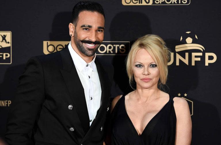 Pamela Anderson claimed that her boyfriend Adil Rami has cheated on her as she appeared to announce their split in an emotional Instagram post.The model and actress said that “two years of [her] life have been a big lie” while alleging that the footballer had been “living a double life.”Sharing a black and white photo of her and the Marseille player on her Instagram account, she wrote: “It’s hard to accept. The last (more than) 2.years [sic] of my life have been a big lie.“I was scammed, led to believe… we were in big love? I’m devastated to find out in the last few days. That he was living a double life.> View this post on Instagram> > A post shared by The Pamela Anderson Foundation (@pamelaanderson) on Jun 24, 2019 at 11:45pm PDT“He used to joke about other players who had girlfriends down the street in apartments close to their wives. He called those men monsters.”She went on to allege that Rami had “lied to all” and asked why she had not been “wise enough” to “help [her]self.”Rami is yet to address the claims made by Anderson. Standard Online has contacted representatives for the player for further comment.The pair began dating in 2017 after meeting at the Monaco Grand Prix in May and previously split up in September 2018 after Anderson reportedly turned down a marriage proposal.They are thought to have then rekindled their relationship in March this year and were pictured together in Malibu, California earlier this month.Anderson was previously married to Motley Crue drummer Tommy Lee, with whom she shares sons Brandon and Dylan, musician Kid Rock and poker player Rick Salomon.