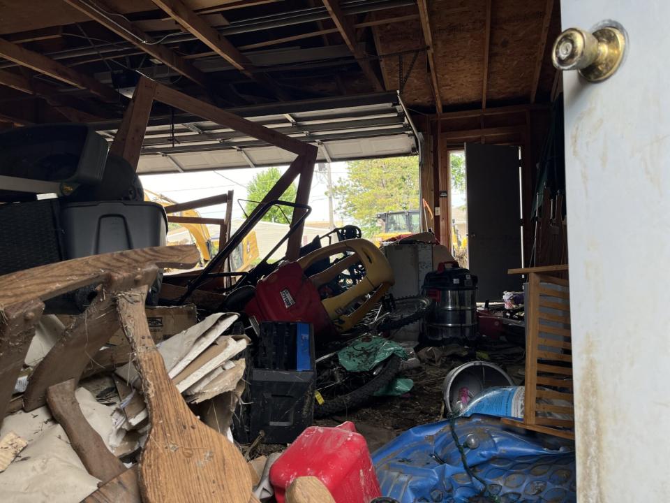 A McCook Lake area home’s garage on July 3, 2024, after a massive flood on June 23. (Joshua Haiar/South Dakota Searchlight)
