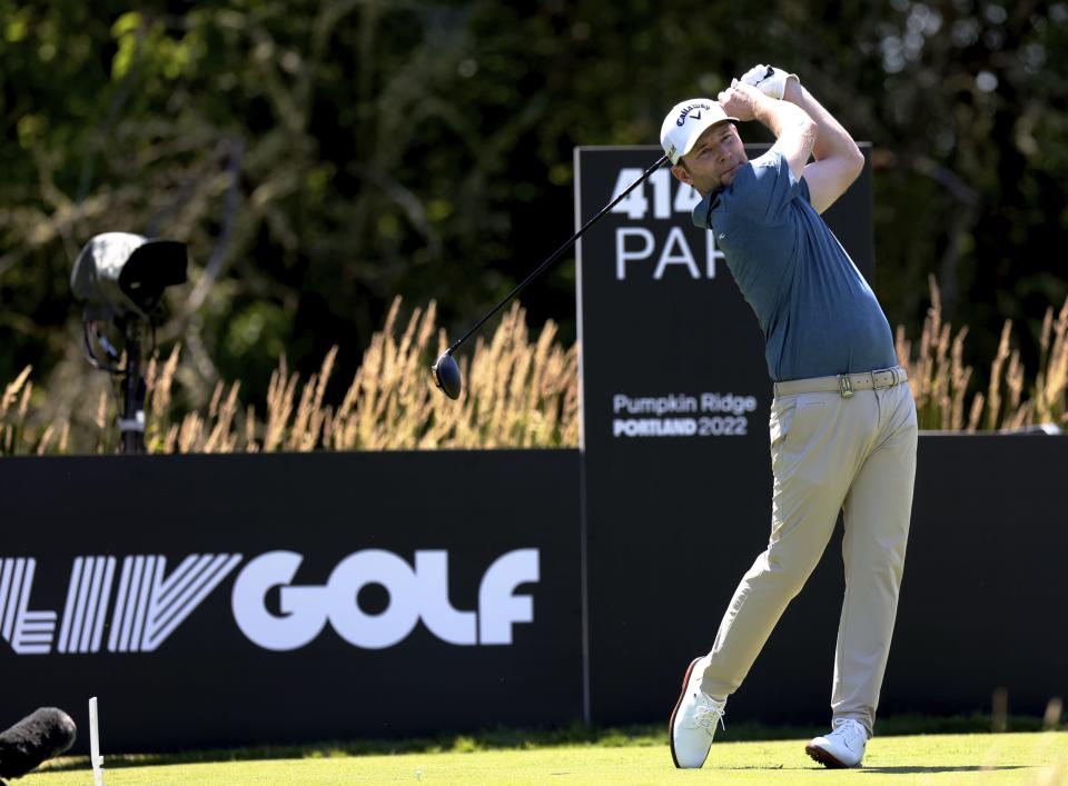 Branden Grace watches his tee shot on the seventh hole during the second round of the Portland Invitational LIV Golf tournament in North Plains, Ore., Friday, July 1, 2022. (AP Photo/Steve Dipaola)