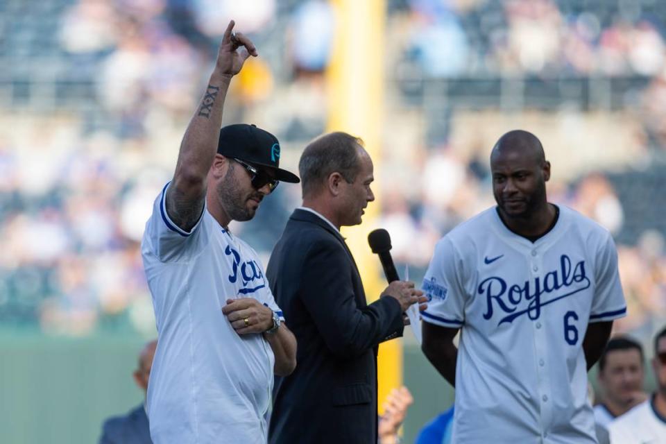 Former Kansas City Royals third baseman Mike Moustakas motions to the crowd during a pre-game ceremony honoring the club’s 2014 American League champions at Kauffman Stadium on Friday, May 17, 2024.