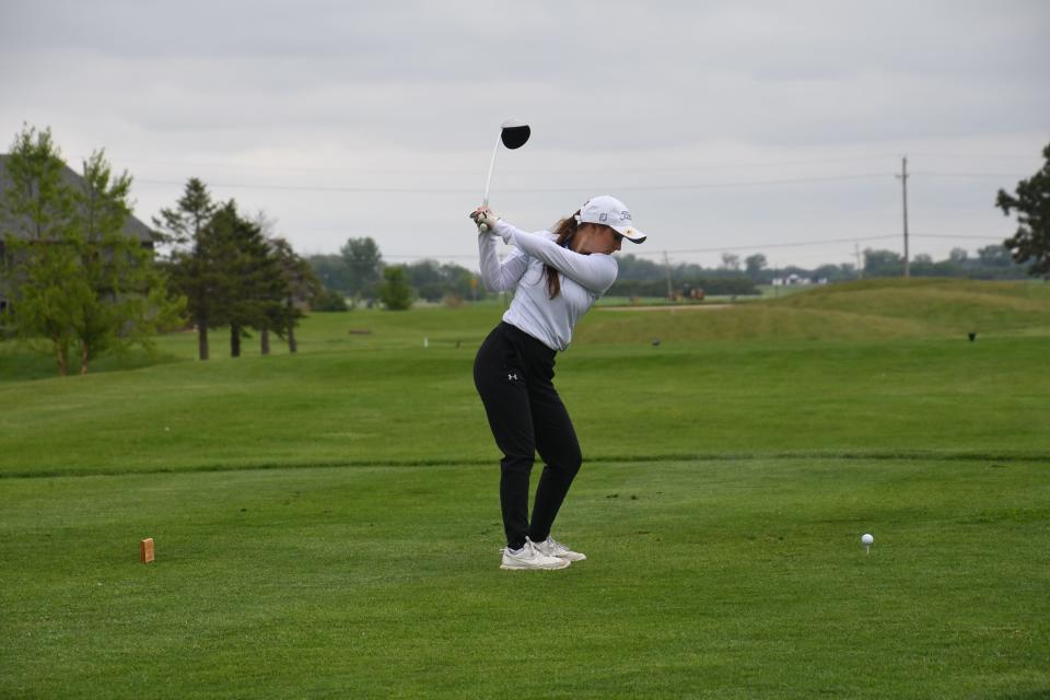 A golfer readies a swing at the girls Class A state golf tournament on Monday, June 6 in Sioux Falls.