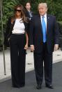 <p>The first lady wore a black suit and sunglasses before departing on Air Force 1 for a visit to France.</p>