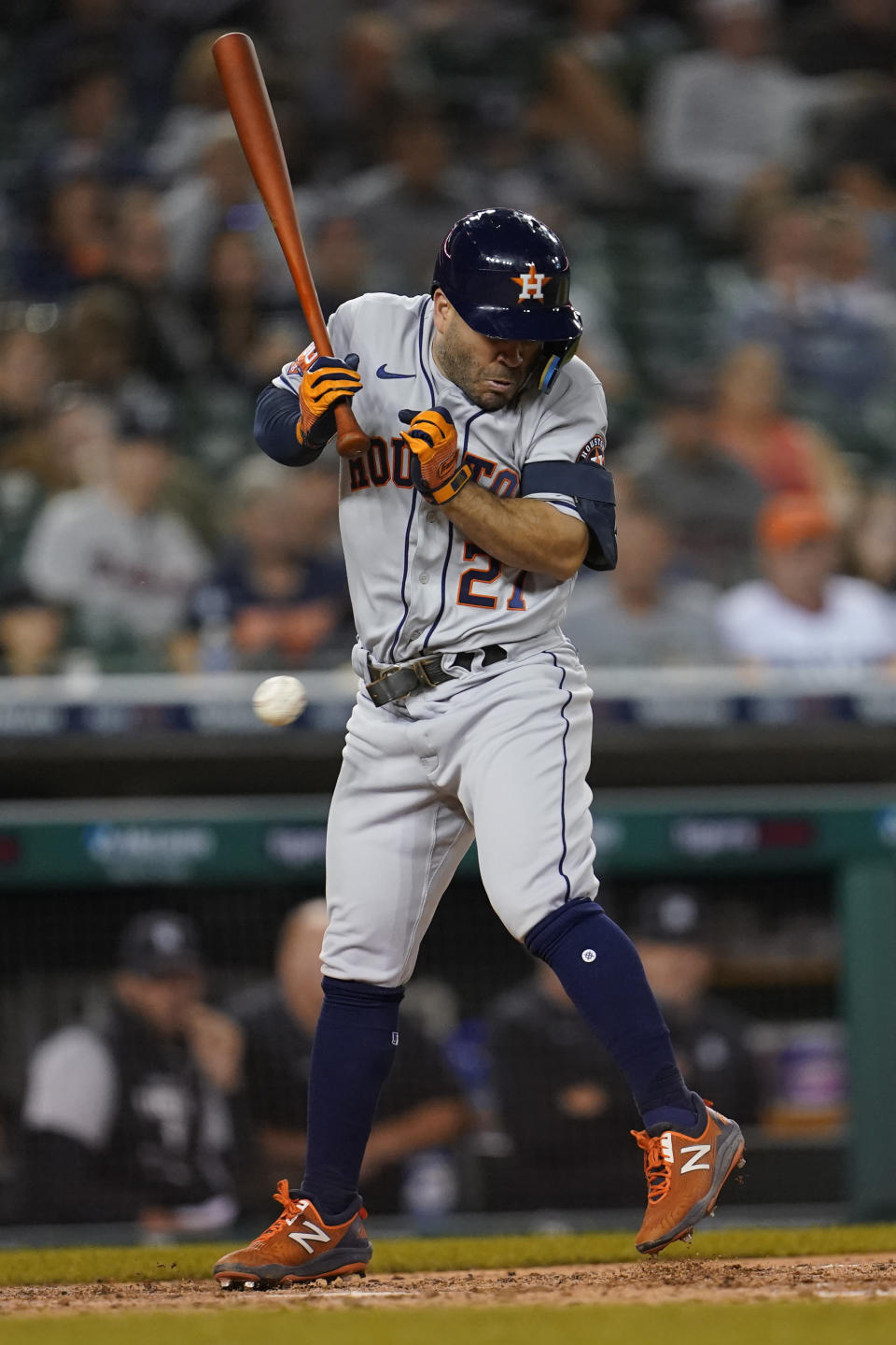 Houston Astros' Jose Altuve is hit by a pitch in the sixth inning of a baseball game against the Detroit Tigers in Detroit, Tuesday, Sept. 13, 2022. (AP Photo/Paul Sancya)