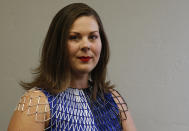 Chelsey Branham, a member of the Chickasaw Nation, and a Democratic candidate for a seat in the Oklahoma House, is pictured during an interview in Oklahoma City, Tuesday, Oct. 16, 2018. She is wearing a Chickasaw beaded collar that she made. Branham said that President Trump's references to Elizabeth Warren as "fake Pocahontas" are offensive because they show how pop culture has glossed over the treatment of Native Americans, particularly women. (AP Photo/Sue Ogrocki)