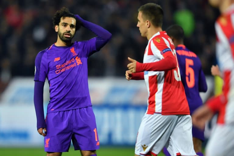 Head-scratcher: Mohamed Salah (left) failed to fire as Liverpool suffered a shock 2-0 defeat to Red Star Belgrade
