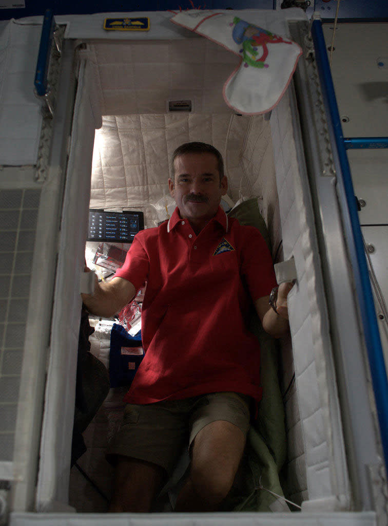 Inside my Sleep Pod - it serves as my bedroom, recording studio, and twitter zone while on the Space Station.