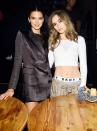 Kendall Jenner and Suki Waterhouse pose together at the DKNY 30th anniversary party at St. Ann’s Warehouse in N.Y.C. during New York Fashion Week on Monday. 