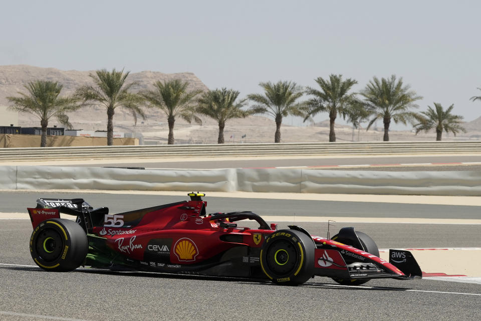 Ferrari driver Carlos Sainz of Spain steers his car during a Formula One pre season test at the Bahrain International Circuit in Sakhir, Bahrain, Friday, Feb. 24, 2023.(AP Photo/Frank Augstein)