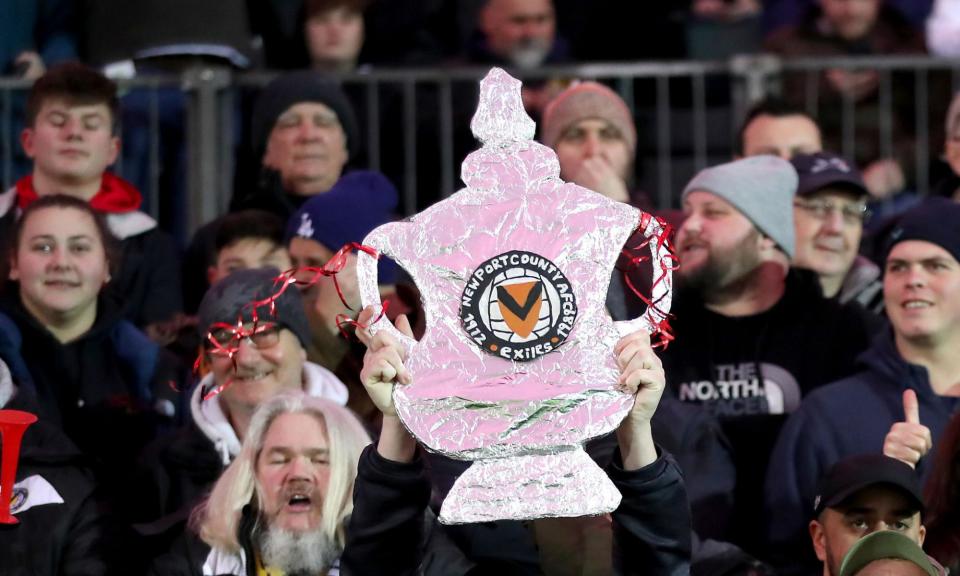 <span>Newport fans at Rodney Parade in 2018 during their fourth-round draw with <a class="link " href="https://sports.yahoo.com/soccer/teams/tottenham/" data-i13n="sec:content-canvas;subsec:anchor_text;elm:context_link" data-ylk="slk:Spurs;sec:content-canvas;subsec:anchor_text;elm:context_link;itc:0">Spurs</a>, which earned them a replay at Wembley.</span><span>Photograph: Andrew Matthews/PA</span>