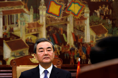 China's State Councilor and Foreign Minister Wang Yi is seen during a talk with Vietnam's Deputy Prime Minister and Foreign Minister Pham Binh Minh at the Government Guesthouse in Hanoi, Vietnam April 1, 2018. REUTERS/Kham