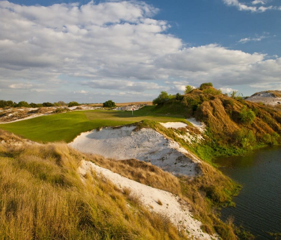 <p>Courtesy Image</p><p>The bar for golf in Florida is high. There are more than 1,250 golf courses in the Sunshine State and many open to the public are truly fantastic—TPC Sawgrass, PGA National, and Bay Hill, to name a few. But Bill Moore and Ben Crenshaw’s <a href="https://www.streamsongresort.com/golf-courses/" rel="nofollow noopener" target="_blank" data-ylk="slk:Streamsong Red;elm:context_link;itc:0;sec:content-canvas" class="link ">Streamsong Red</a> is our favorite in Florida. Part of a golf trilogy at the Streamsong resort, the Red course was constructed on the site of a former phosphate strip mine (as were the Blue and the Black courses). The views are wild. With massive mounds covered in wispy grass and epic waste areas, it doesn’t play like your average course south of the panhandle. Balls take big bounces in the fairway, and many green complexes play like a links course you’d find in Ireland. There are a few forced carries, like on the signature par-3 16th, but overall the course is one of the most fun in America. </p>