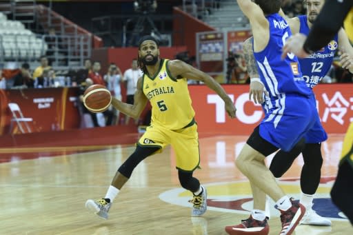 Australia's Patty Mills (C) led his team into the Basketball World Cup semis with a win over the Czech Republic